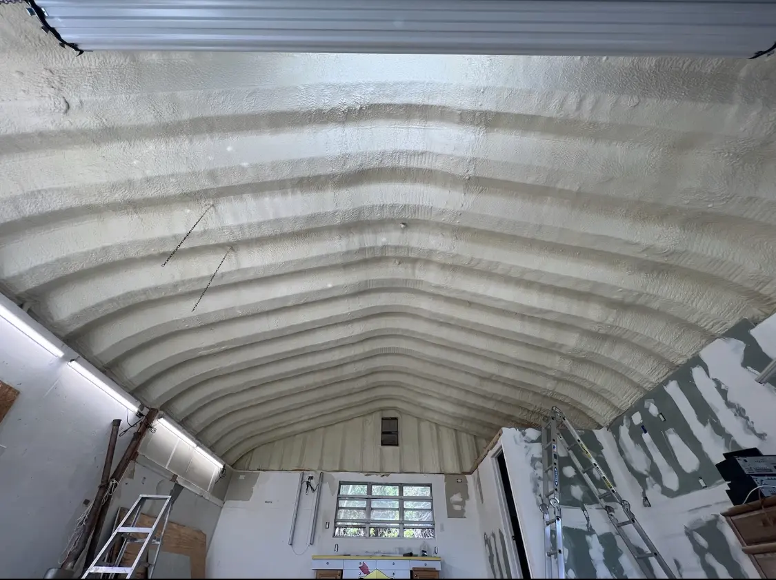 Spray polyurethane foam applied to the underside of a metal roof deck in Palm Valley